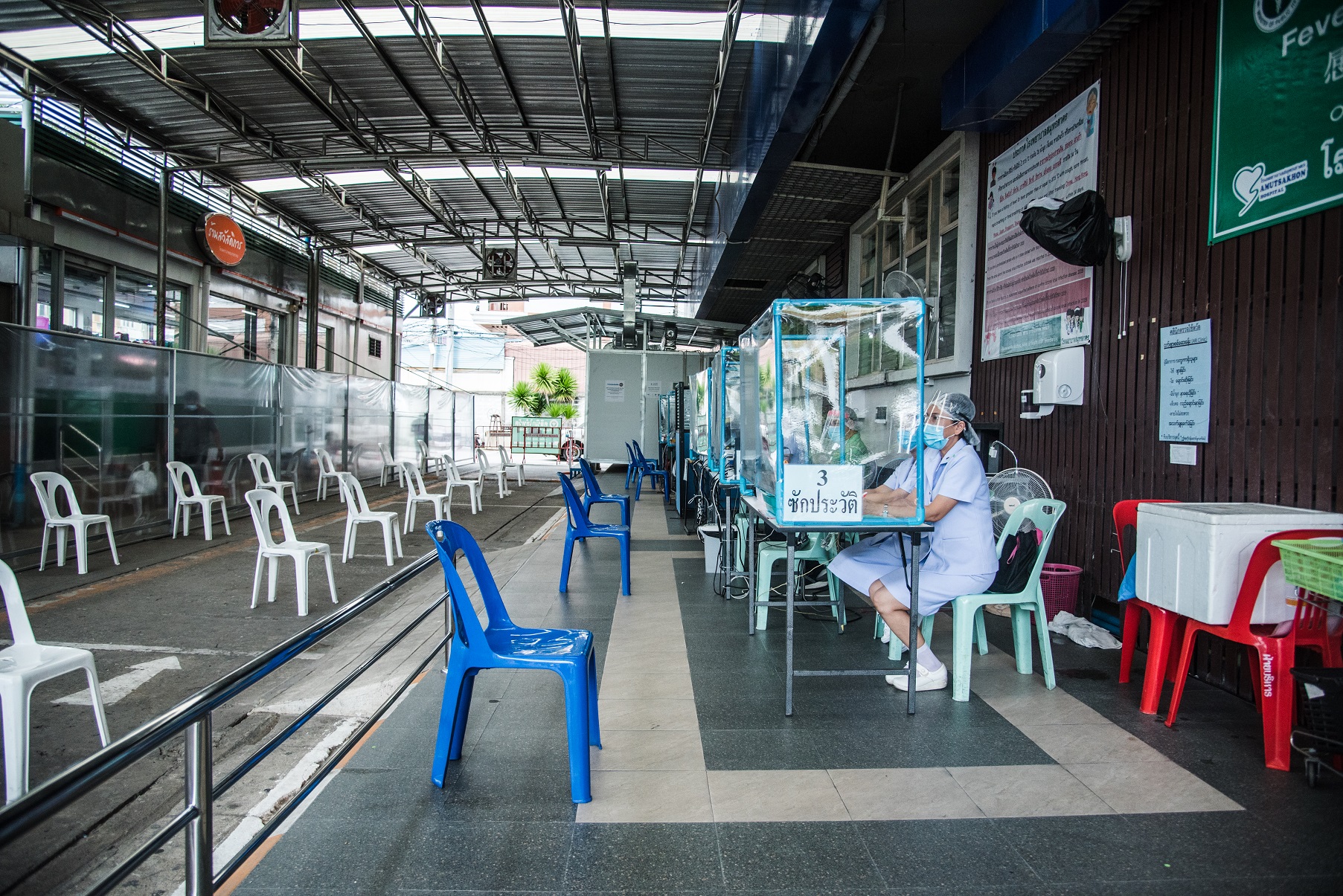 Nurses at COVID-19 Clinic, Sumut Sakhon Hospital, receives up to 20 patients, both Thais, and Burmese migrant workers